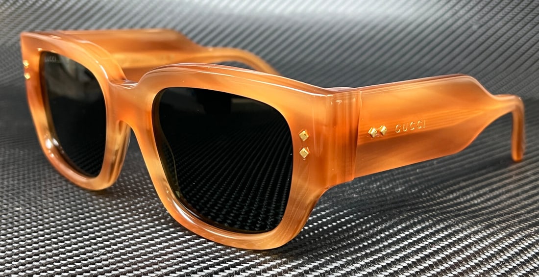 GUCCI GG1261S 004 Havana Green Men's Sunglasses with Authenticity: GUCCI GG1261S 004 Havana Green Men's Sunglasses with Authenticity Elevate your eyewear collection with these GUCCI GG1261S sunglasses, featuring a stylish Havana frame complemented by striking green l