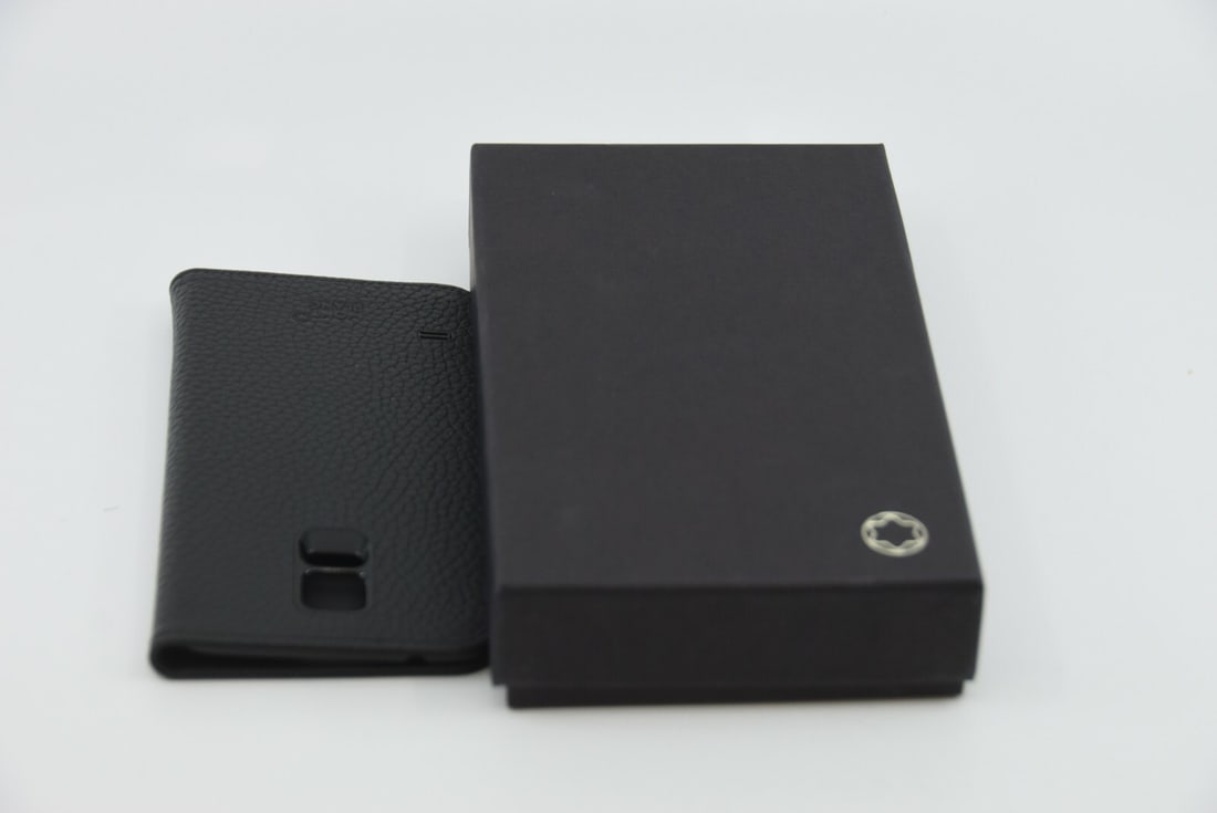 Montblanc Folding Folio Case for Samsung Galaxy SG5 Black Leather 112612: Montblanc Folding Folio Case for Samsung Galaxy SG5 Black Leather 112612 This Montblanc folding folio case is designed for the Samsung Galaxy SG5, crafted from premium black leather for a sophisticate