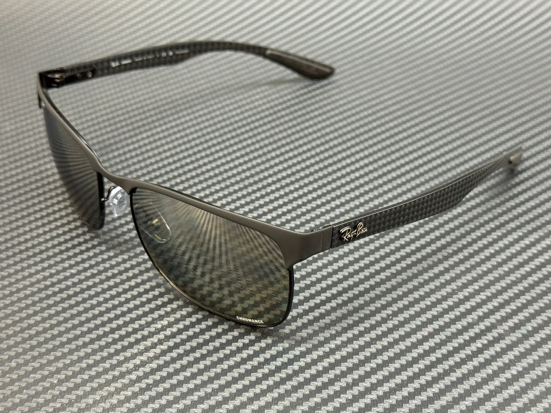 RAY BAN RB8319CH 186 5J Matte Black Square Sunglasses with Polarized Lenses: RAY BAN RB8319CH 186 5J Matte Black Square Sunglasses with Polarized Lenses Elevate your style with the RAY BAN RB8319CH 186 5J Matte Black Square Sunglasses. These men's sunglasses feature a sleek ma