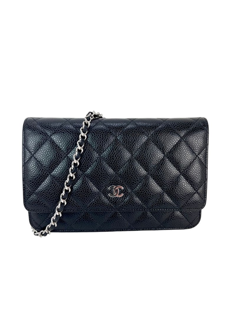 Chanel Quilted Caviar Wallet on Chain Clutch Black Silver Hardware: Chanel Quilted Caviar Wallet on Chain Clutch Black Silver Hardware This Chanel Quilted Caviar Calfskin Wallet on a Chain Clutch is a stylish accessory perfect for both casual and formal occasions. Cra