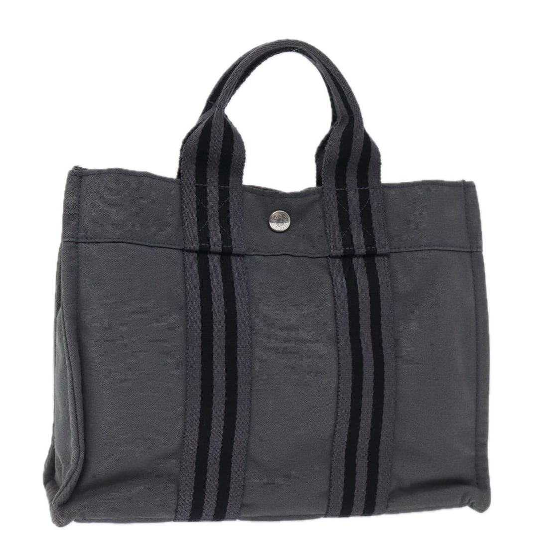HERMES Fourre Tout PM Canvas Hand Bag Black Gray Made in France: HERMES Fourre Tout PM Canvas Hand Bag Black Gray Made in France Introducing the HERMES Fourre Tout PM Hand Bag, a stylish accessory designed for everyday use. Crafted from durable canvas, this bag fea