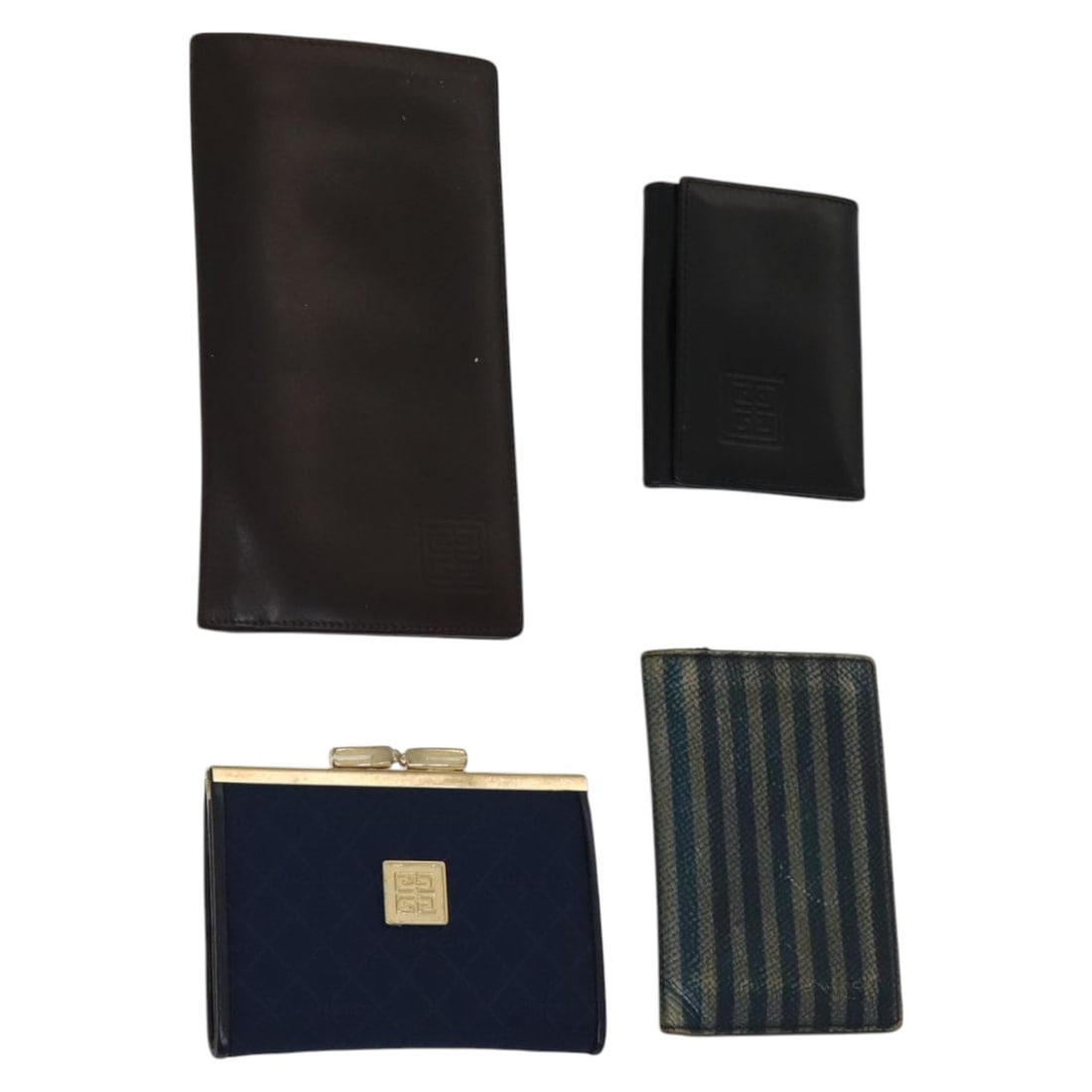 GIVENCHY Navy Black Leather Billfold Key Case 4 Set Auth: GIVENCHY Navy Black Leather Billfold Key Case 4 Set Auth This GIVENCHY billfold key case features a sophisticated design made from high-quality leather in a striking navy and black color combination.
