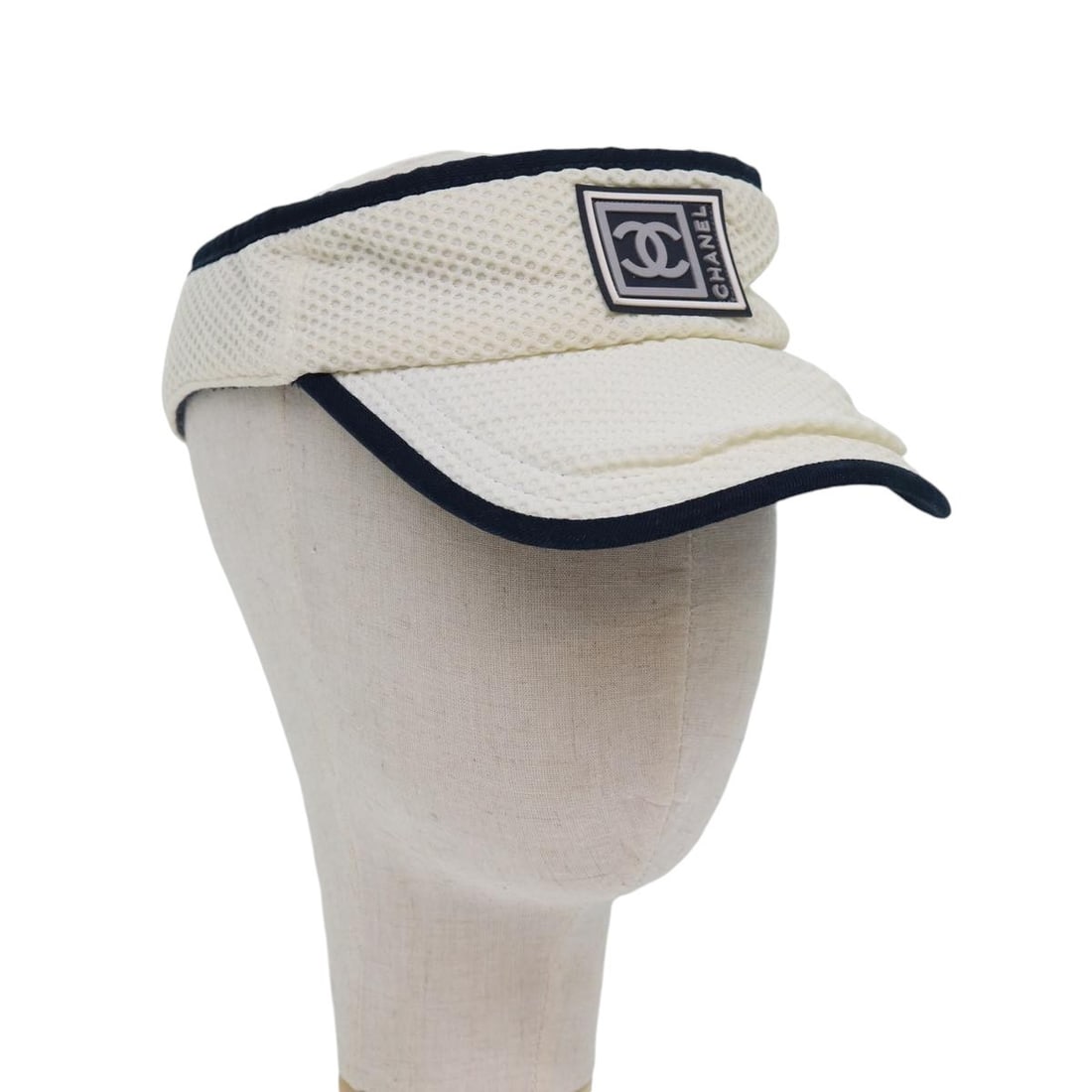 CHANEL White Silver Cotton Sports Sun Visor with CC Logo: CHANEL White Silver Cotton Sports Sun Visor with CC Logo Elevate your outdoor style with this CHANEL Sports Sun Visor, expertly crafted from quality cotton in a sophisticated white and silver color sc