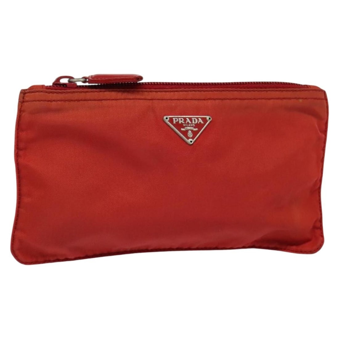 PRADA Red Nylon Pouch Italy Auth AC3706: PRADA Red Nylon Pouch Italy Auth AC3706 This PRADA pouch is a stylish and functional accessory crafted from high-quality nylon. Its vibrant red exterior makes it eye-catching, while its compact design