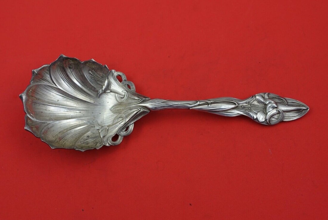 Frank Smith Lily Sterling Silver Berry Spoon 9 1/8 Heavy Cast: Frank Smith Lily Sterling Silver Berry Spoon 9 1/8 Heavy Cast This exquisite serving spoon features the elegant "Lily" pattern by Frank Smith, crafted from high-quality sterling silver. With a length
