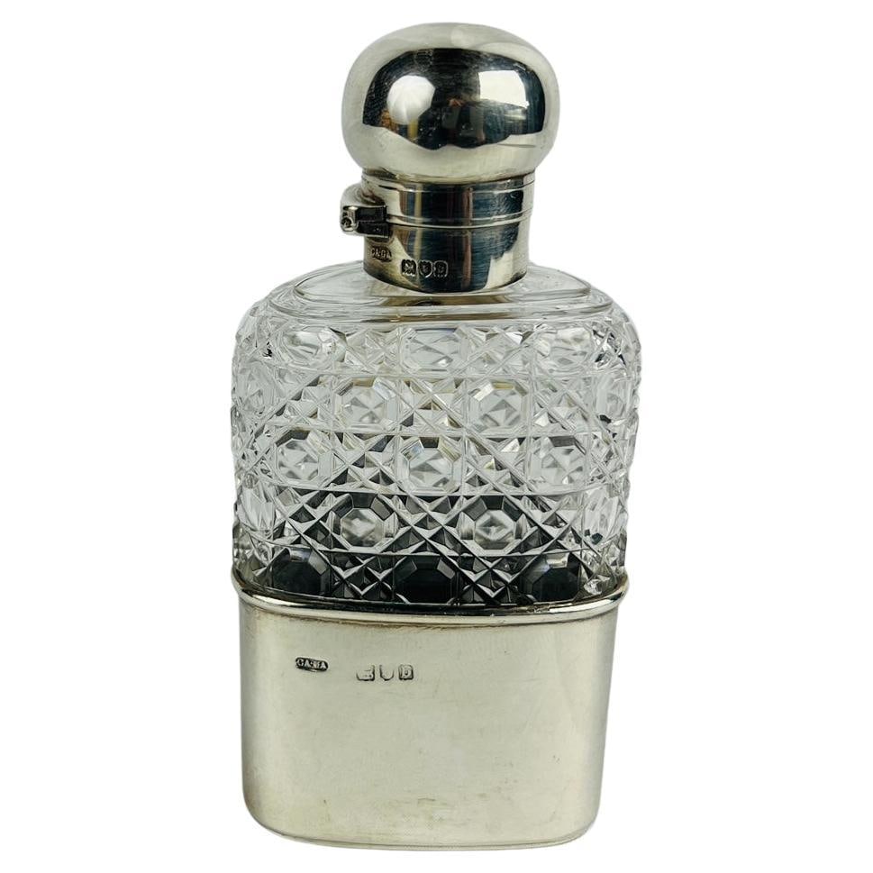 Charles & George Asprey 1897 Sterling Silver Cut Glass Locking Hip Flask: Charles & George Asprey 1897 Sterling Silver Cut Glass Locking Hip Flask This exquisite Sterling Silver and Cut Glass Locking Hip Flask, crafted by the esteemed London silversmiths Charles & George As