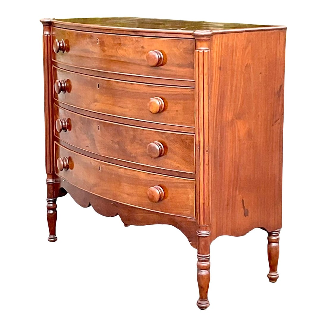 Vintage Regency Bow Front Mahogany Chest of Drawers: Vintage Regency Bow Front Mahogany Chest of Drawers This exquisite vintage Regency chest of drawers showcases a stylish bow front design crafted from rich English mahogany. The piece features elegant