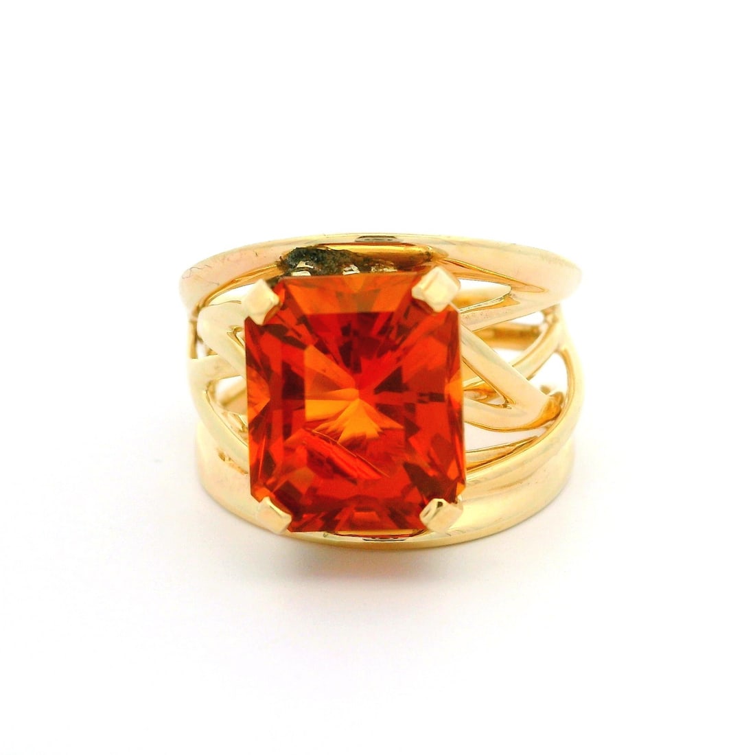 14k Yellow Gold Open Work Wide Cocktail Ring with Orange Citrine: 14k Yellow Gold Open Work Wide Cocktail Ring with Orange Citrine This stunning cocktail ring features a brilliant cut natural citrine in a deep orange hue, elegantly prong set in solid 14k yellow gold