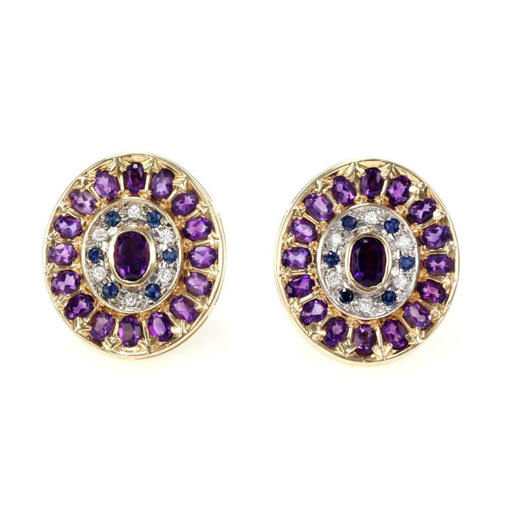 Erte Seven Arts 14k Gold Amethyst Sapphire Diamond Huggie Earrings: Erte Seven Arts 14k Gold Amethyst Sapphire Diamond Huggie Earrings This exquisite pair of earrings showcases the artistry of Erte, featuring a stunning design crafted from 14k yellow gold. The earring