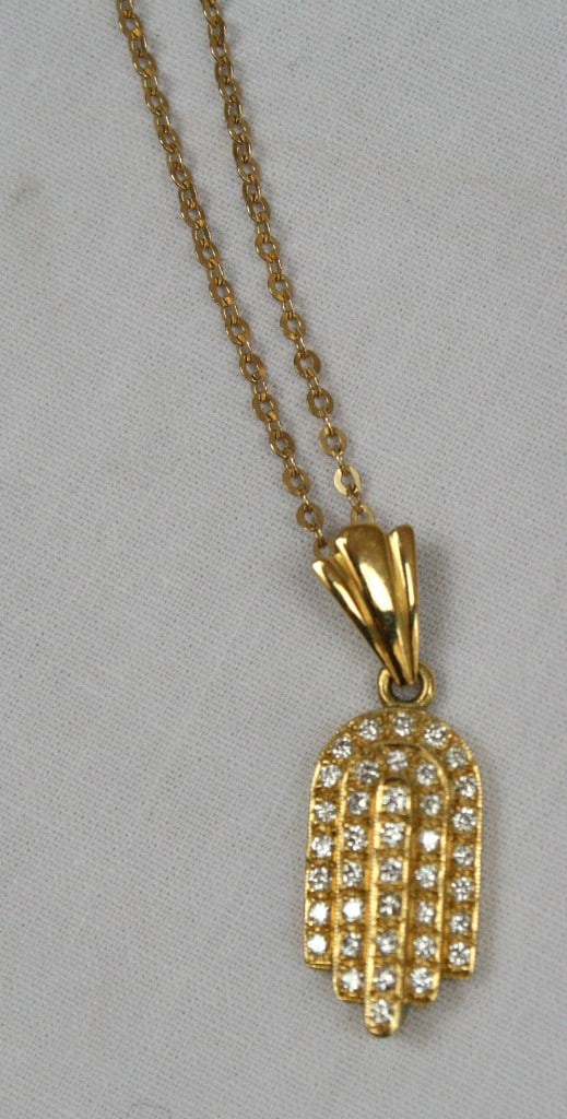 14K Yellow Gold Diamond Judaical Hand Necklace 37 1/64 ct: 14K Yellow Gold Diamond Judaical Hand Necklace 37 1/64 ct This stunning Judaical necklace features a beautifully detailed hand design crafted from 14K yellow gold and adorned with 37 1/64 ct of exquis