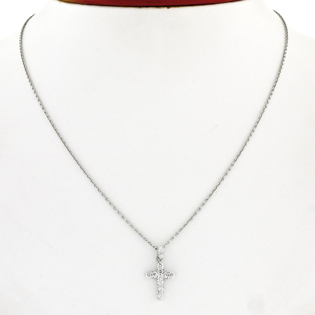 Elegant Petite Platinum Cross Pendant with 0.30ct Diamonds: Elegant Petite Platinum Cross Pendant with 0.30ct Diamonds This exquisite Petite Solid Platinum Cross Pendant is adorned with 12 natural round brilliant diamonds, totaling 0.30 carats. Crafted from so
