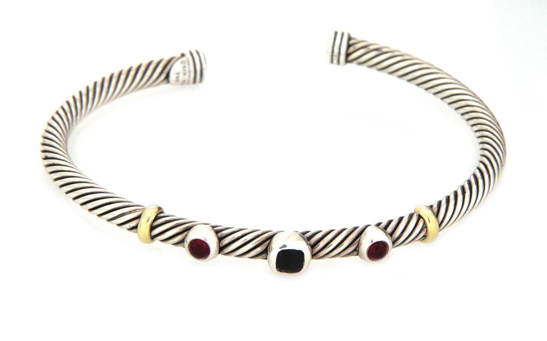 David Yurman Cuff Bracelet Sterling Silver 18k Gold Gemstone Cable Design: David Yurman Cuff Bracelet Sterling Silver 18k Gold Gemstone Cable Design This exquisite cuff bracelet by David Yurman showcases a unique cable design crafted from sterling silver, enhanced with 18k y