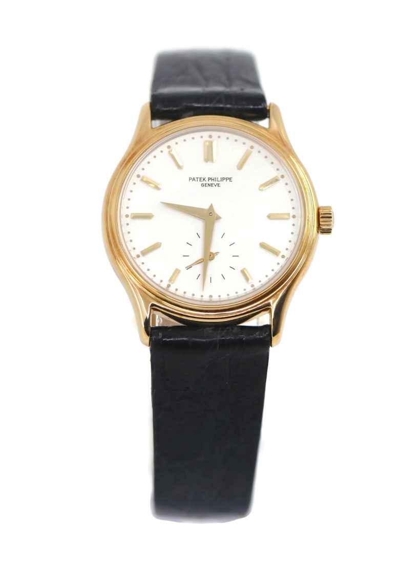 Patek Philippe Calatrava 18K Yellow Gold Watch Ref 3923: Patek Philippe Calatrava 18K Yellow Gold Watch Ref 3923 This exquisite Patek Philippe Calatrava wristwatch, model 3923, features a luxurious 18K yellow gold case with a diameter of 32mm. The watch is