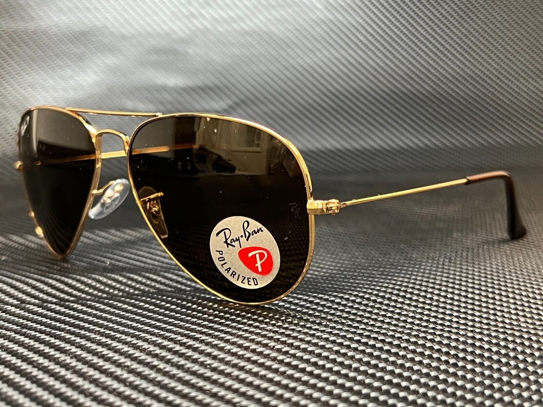Ray-Ban RB3025 Arista Gold Aviator Polarized Sunglasses 58mm: Ray-Ban RB3025 Arista Gold Aviator Polarized Sunglasses 58mm Experience timeless style with these Ray-Ban RB3025 Arista Gold sunglasses. Featuring a classic aviator design, these sunglasses are equipp