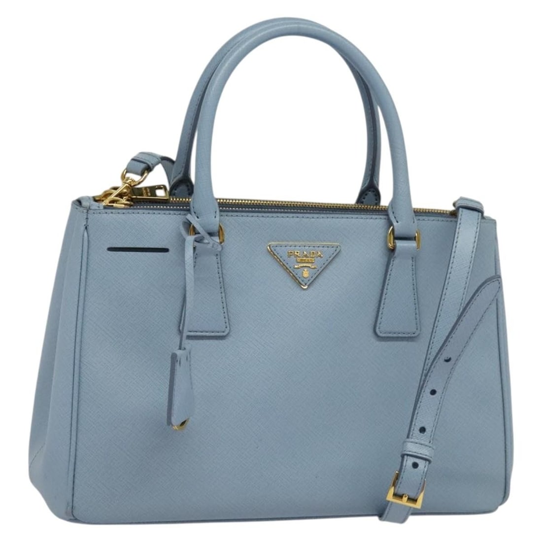 PRADA Galleria Saffiano Leather Hand Bag Light Blue Gold Auth 133807: PRADA Galleria Saffiano Leather Hand Bag Light Blue Gold Auth 133807 This exquisite PRADA Galleria Hand Bag showcases luxury with its Saffiano leather exterior in a stunning light blue and gold color