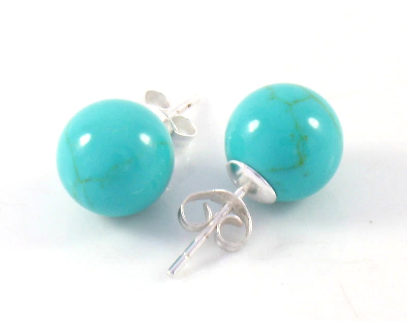 Elegant 10mm Blue Turquoise Stud Earrings in .925 Sterling Silver: Elegant 10mm Blue Turquoise Stud Earrings in .925 Sterling Silver Enhance your accessory collection with these exquisite 10mm Blue Turquoise Ball Stud Earrings. Crafted from solid .925 sterling silver