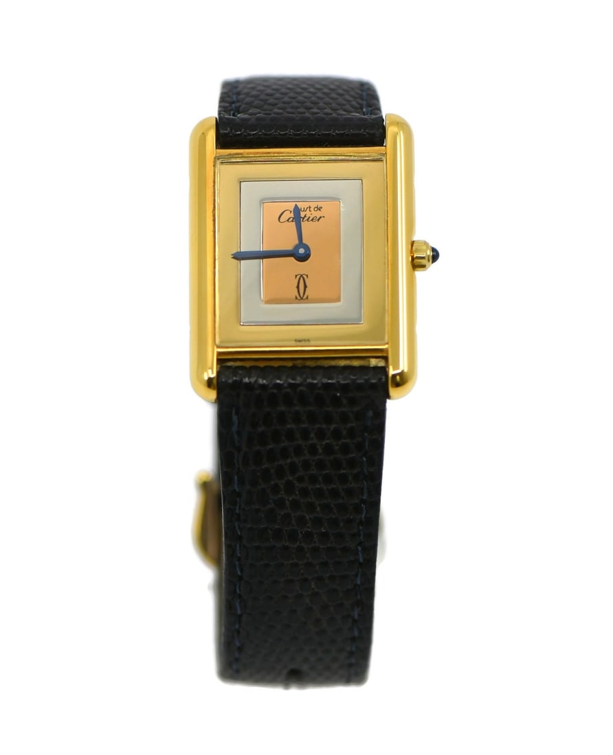 Cartier Tank Vermeil Gold Plated Sterling Silver Watch 81006 Authentic: Cartier Tank Vermeil Gold Plated Sterling Silver Watch 81006 Authentic This Cartier Tank wristwatch exudes elegance and sophistication. Crafted with a gold-plated sterling silver case, this timepiece