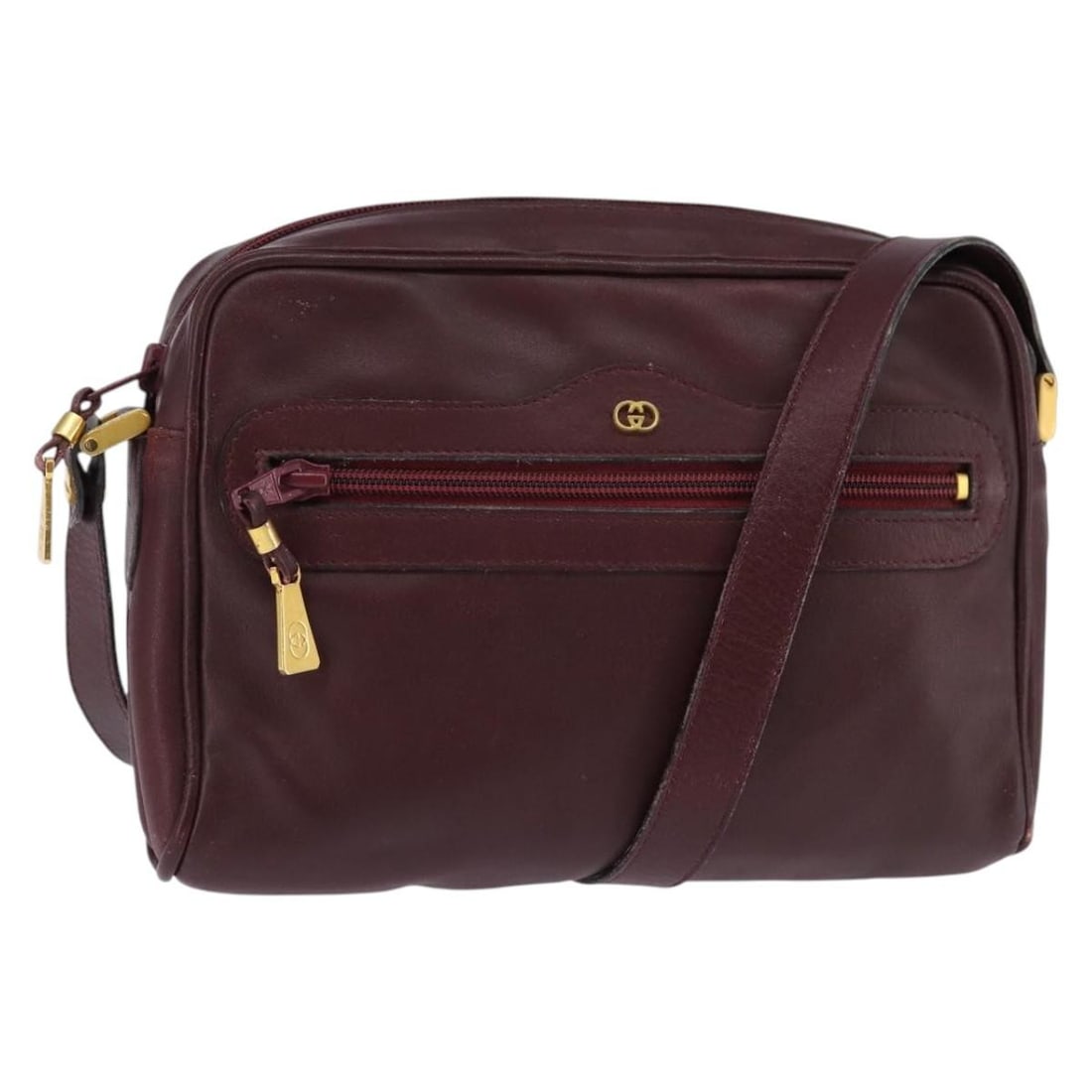 GUCCI Bordeaux Leather Shoulder Bag with Gold Accents BA5601: GUCCI Bordeaux Leather Shoulder Bag with Gold Accents BA5601 This elegant GUCCI shoulder bag is crafted from high-quality leather in a rich bordeaux color, accented with gold details. Its compact size