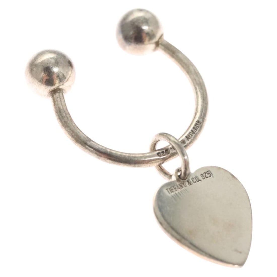 Tiffany & Co. Loving Heart Ring Ag925 Silver Authentic: Tiffany & Co. Loving Heart Ring Ag925 Silver Authentic The Tiffany & Co. Loving Heart Ring is a stunning piece crafted from high-quality Ag925 silver, known for its remarkable shine and durability. Th