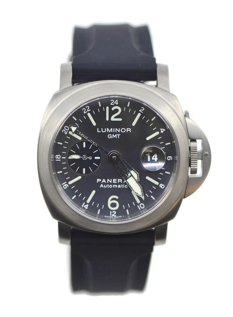 Panerai Luminor GMT PAM00089 Titanium Watch with Box 44mm: Panerai Luminor GMT PAM00089 Titanium Watch with Box 44mm Experience the elegance and performance of the Panerai Luminor GMT Titanium Watch PAM00089. This pre-owned wristwatch features a robust 44mm t