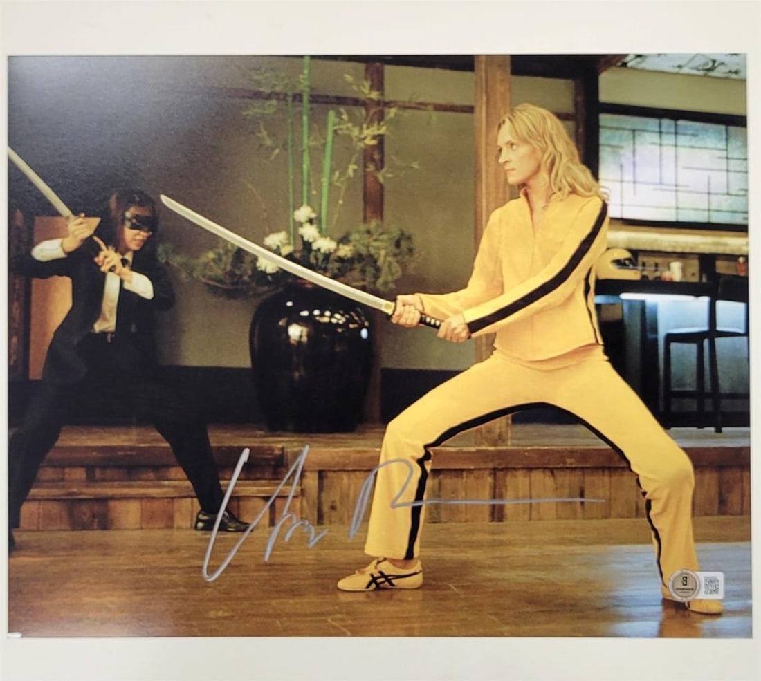 Uma Thurman Autographed Kill Bill 11x14 Photo Beckett Authenticated: Uma Thurman Autographed Kill Bill 11x14 Photo Beckett Authenticated This is an original 11x14 photograph signed by Uma Thurman, featuring her iconic role from the film Kill Bill. The autograph has bee