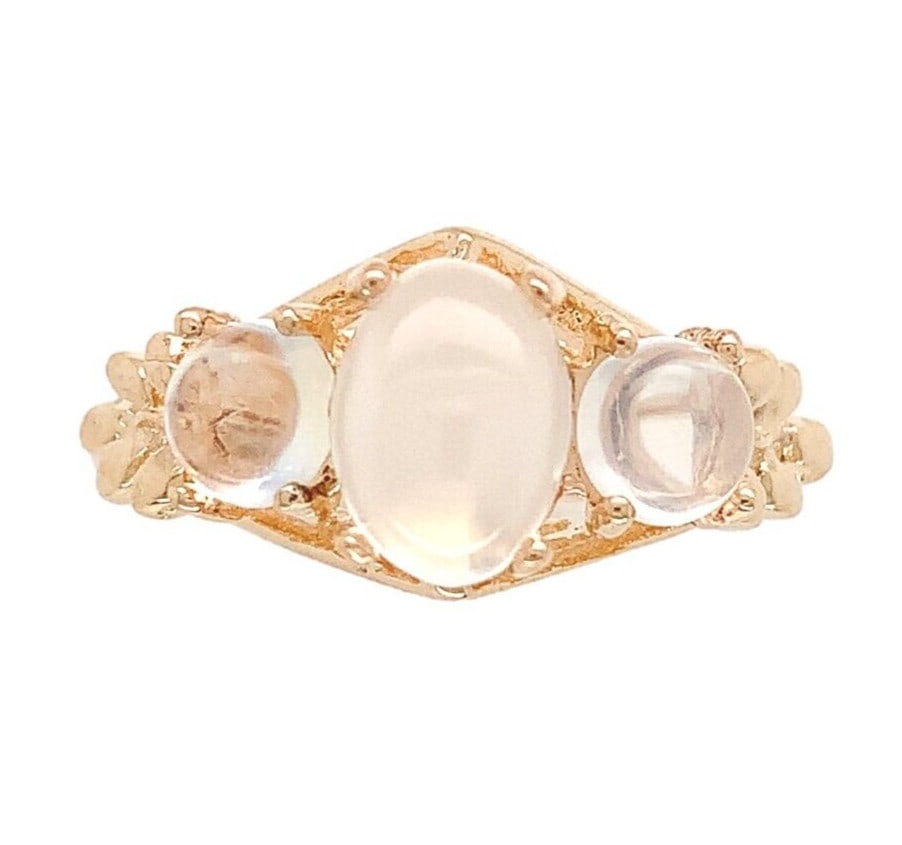 14k Yellow Gold Three-Stone Ring with Genuine Moonstones Size 6: 14k Yellow Gold Three-Stone Ring with Genuine Moonstones Size 6 This exquisite 14k yellow gold three-stone ring features a stunning arrangement of genuine natural moonstones. The centerpiece is an ova
