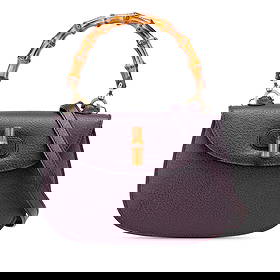 Gucci Calfskin Bamboo Night Leather Bag Purple with Bamboo Handle: Gucci Calfskin Bamboo Night Leather Bag Purple with Bamboo Handle Introducing the Gucci Calfskin Bamboo Night, a stunning bag crafted from premium leather. This elegant piece features a unique bamboo