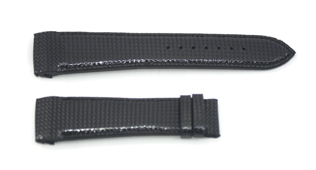 Authentic Zenith Black Carbon Leather Watch Strap 22mm: Authentic Zenith Black Carbon Leather Watch Strap 22mm Enhance your wristwatch with this authentic Zenith Black Carbon Leather Strap. Designed for comfort and durability, this strap features a sleek b