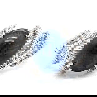 Stunning Platinum Ring with 3.03 Ct Sapphire and 0.50 Ct Diamonds: Stunning Platinum Ring with 3.03 Ct Sapphire and 0.50 Ct Diamonds This exquisite Platinum ring showcases a stunning 3.03 Ct. Oval Cabochon Sapphire, elegantly complemented by approximately 0.50 Ct. of