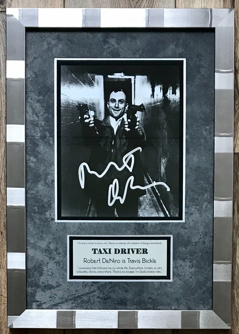 Robert De Niro Signed 8x10 Taxi Driver Custom Framed Display JSA Authenticated: Robert De Niro Signed 8x10 Taxi Driver Custom Framed Display JSA Authenticated This beautifully custom framed display features a signed 8x10 photograph of Robert De Niro as Travis Bickle from the icon