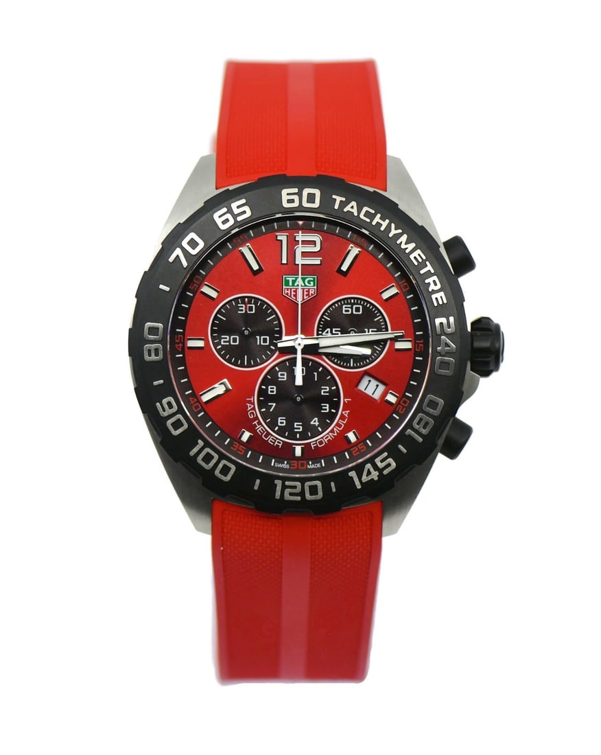 TAG Heuer Formula 1 Red Rubber Stainless Steel Watch CAZ101AN: TAG Heuer Formula 1 Red Rubber Stainless Steel Watch CAZ101AN Experience the perfect blend of style and functionality with the Tag Heuer Formula 1 Stainless Steel Watch CAZ101AN. This pre-owned wristw
