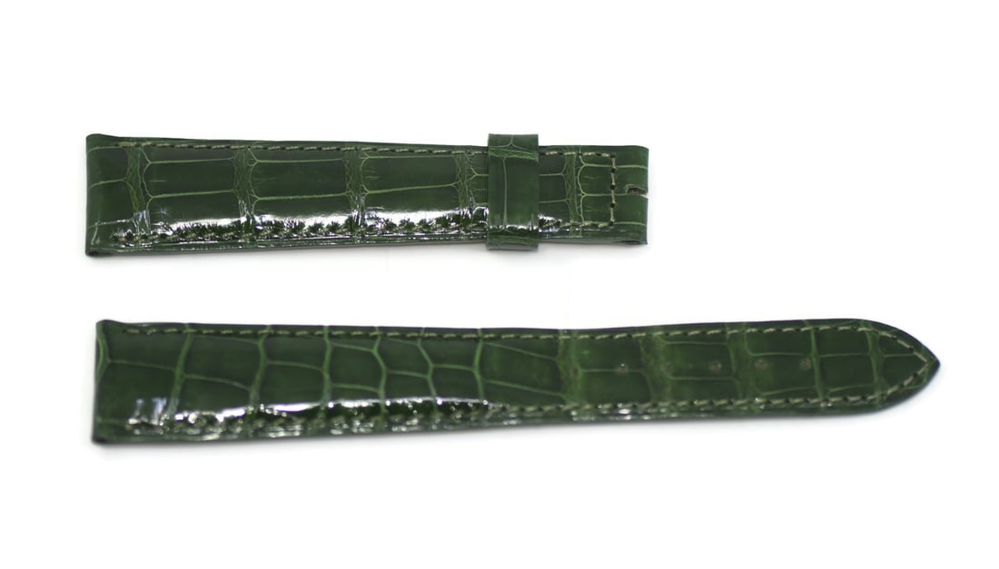 Breguet Authentic Green Leather Wristwatch Band 20mm: Breguet Authentic Green Leather Wristwatch Band 20mm Enhance your timepiece with this authentic Breguet green leather wristwatch band. Crafted from high-quality leather, this band features a width of