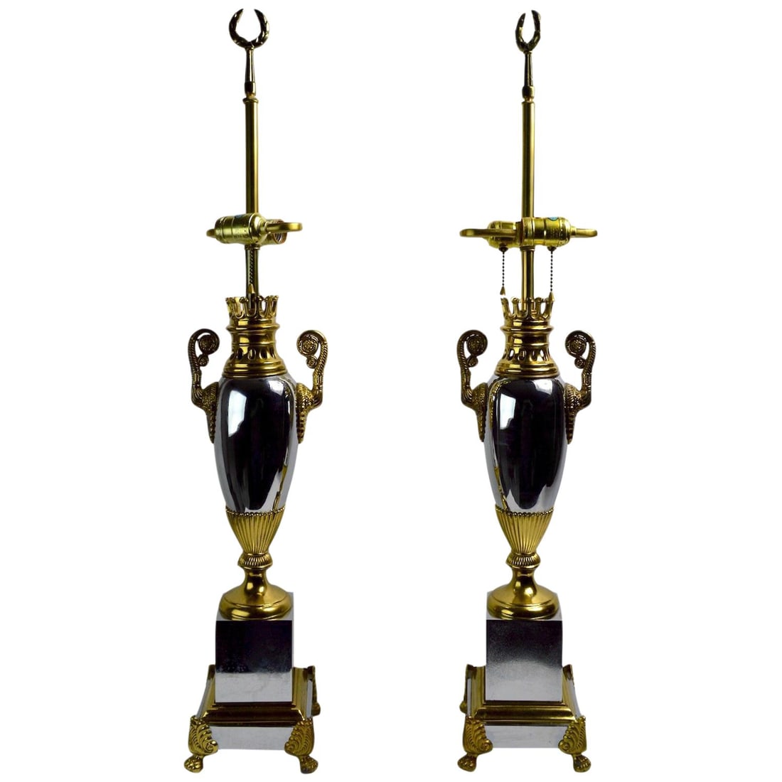 Elegant Tyndale Hollywood Regency Lamps Pair in Chrome Brass: Elegant Tyndale Hollywood Regency Lamps Pair in Chrome Brass This elegant pair of Hollywood Regency lamps by Tyndale, a division of Frederick Cooper, showcases a beautiful blend of Classical and Moder