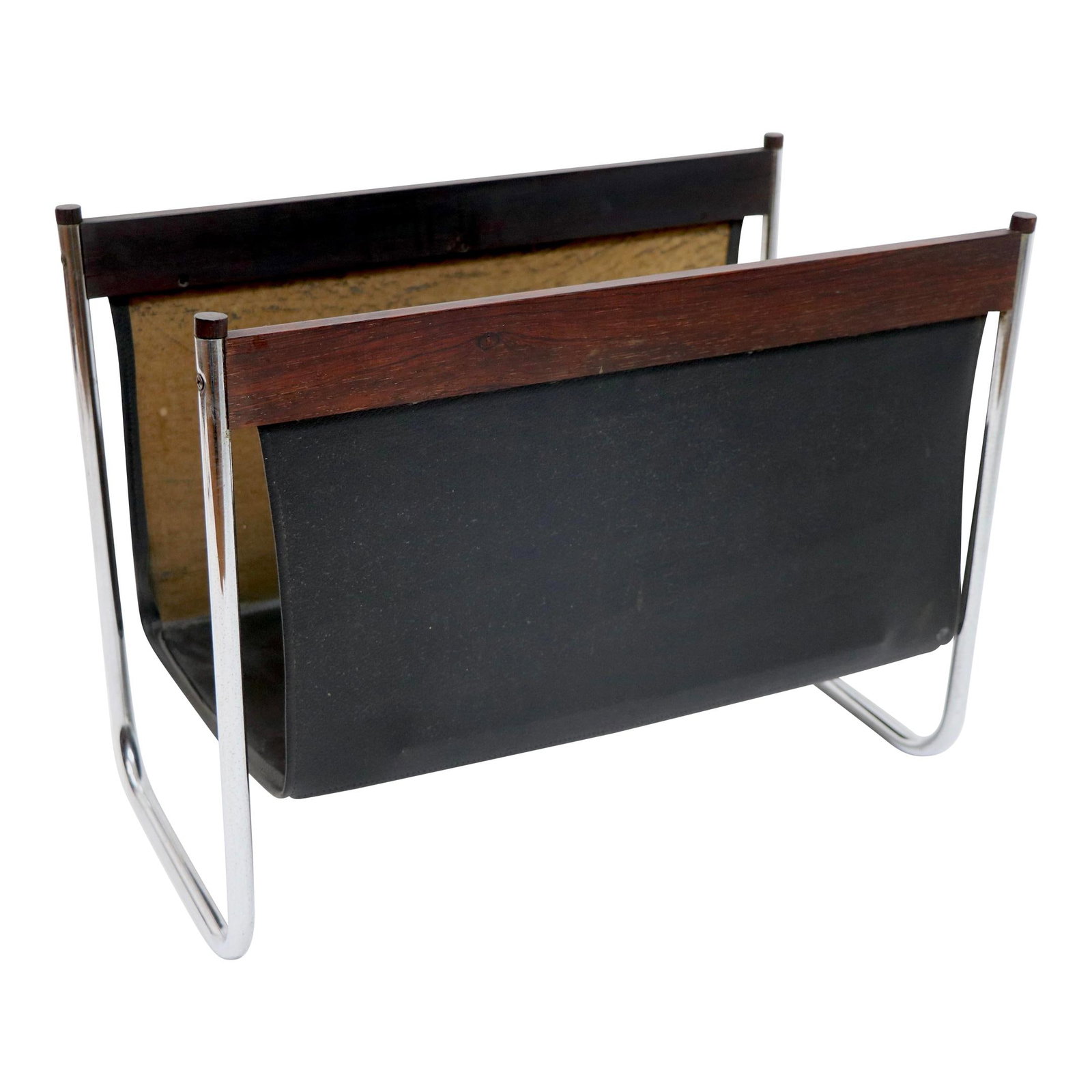 Vintage 1970s Rosewood Chrome Magazine Rack USA: Vintage 1970s Rosewood Chrome Magazine Rack USA This chic and stylish vintage magazine rack serves as both a functional catch-all and a statement piece. Crafted from tubular chrome, it features exquis
