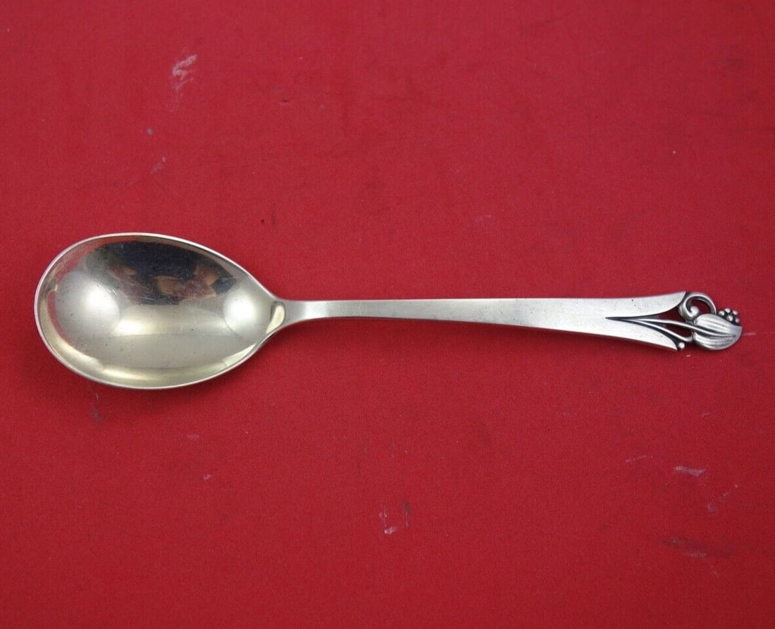 Frank Smith Woodlily Sterling Silver Serving Spoon 6.5": Frank Smith Woodlily Sterling Silver Serving Spoon 6.5" This exquisite sugar spoon from the Woodlily pattern by Frank Smith is crafted from high-quality sterling silver. Measuring 6 1/2 inches, it fea