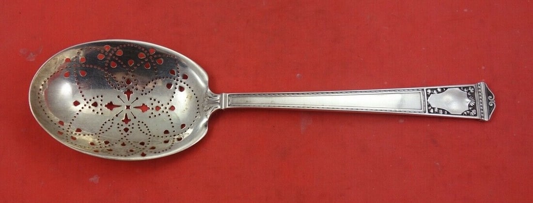 Tiffany & Co San Lorenzo Sterling Silver Ice Spoon 9 1/4 Inches: Tiffany & Co San Lorenzo Sterling Silver Ice Spoon 9 1/4 Inches This exquisite ice spoon, crafted by Tiffany & Co., features the elegant San Lorenzo pattern. Measuring 9 1/4 inches, this sterling silv