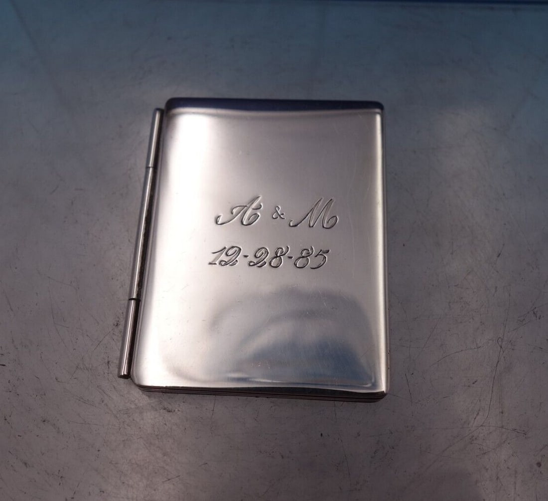 The Thomae Co Sterling Silver Folded Picture Frame for Two Photos: The Thomae Co Sterling Silver Folded Picture Frame for Two Photos This exquisite sterling silver picture frame by The Thomae Co. is designed to hold two cherished photos. When folded, it measures 2 1/