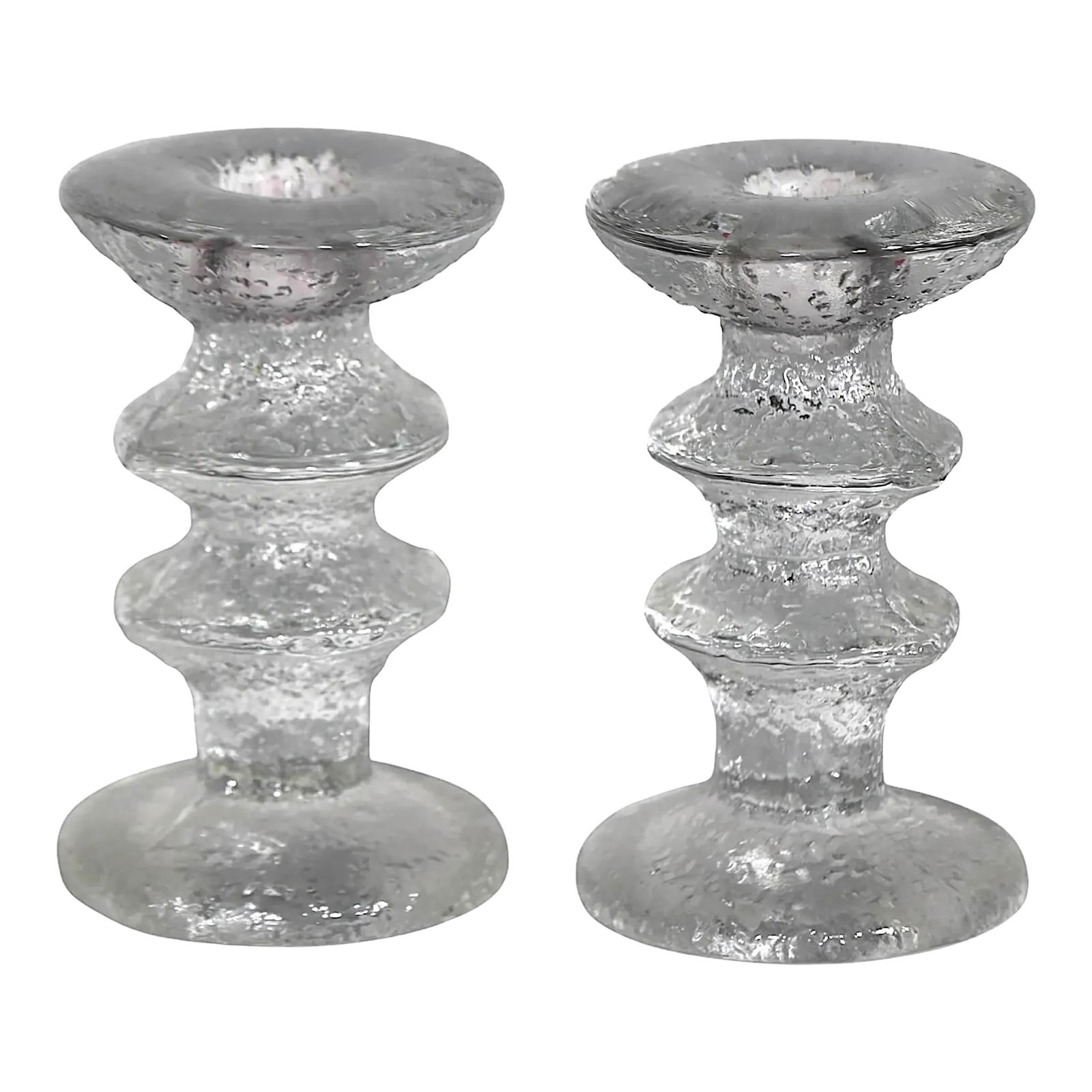 Iittala Festivo Glass Candlesticks by Timo Sarpaneva Signed TS 1960s: Iittala Festivo Glass Candlesticks by Timo Sarpaneva Signed TS 1960s Enhance your decor with this classic pair of Festivo glass candlesticks, expertly designed by Timo Sarpaneva for Iittala. Crafted i