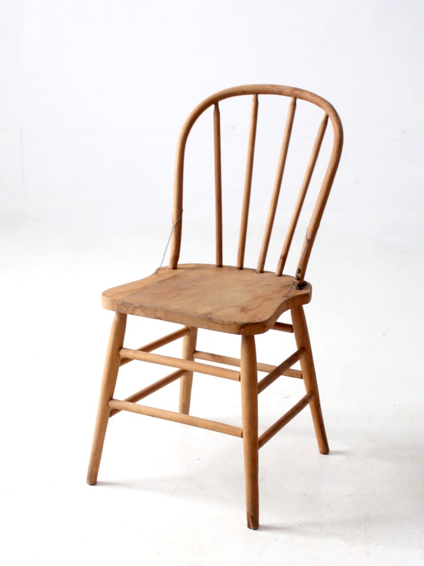 Antique Windsor Chair with Arched Back and Rustic Charm: Antique Windsor Chair with Arched Back and Rustic Charm This antique Bow Back Windsor Farmhouse Chair showcases a beautifully arched back and natural unfinished wood, featuring a warm, aged surface th