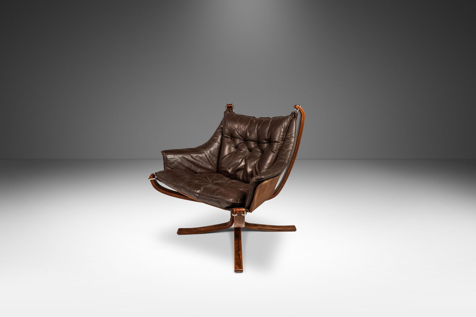Rare Sigurd Ressel Winged Falcon Chair in Burgundy Leather Norway 1970s: Rare Sigurd Ressel Winged Falcon Chair in Burgundy Leather Norway 1970s Introducing a rare Mid-Century Modern Winged Falcon Chair, designed by the renowned Sigurd Ressel for Vatne Mobler, Norway, circ