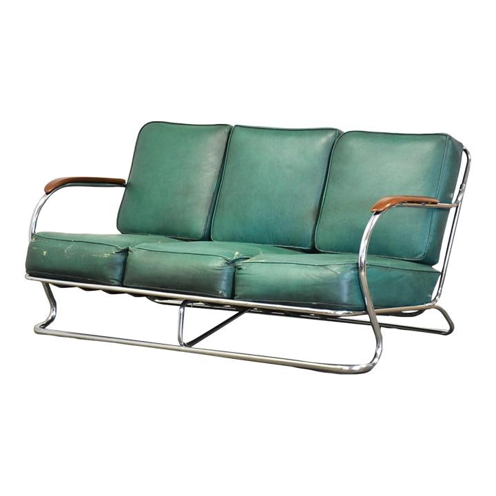1930s Kem Weber Art Deco Tubular Chrome Sofa with Green Vinyl Cushions: 1930s Kem Weber Art Deco Tubular Chrome Sofa with Green Vinyl Cushions This stunning 1930s art deco tubular chrome sofa, designed by Kem Weber, features original green vinyl cushions that complement i