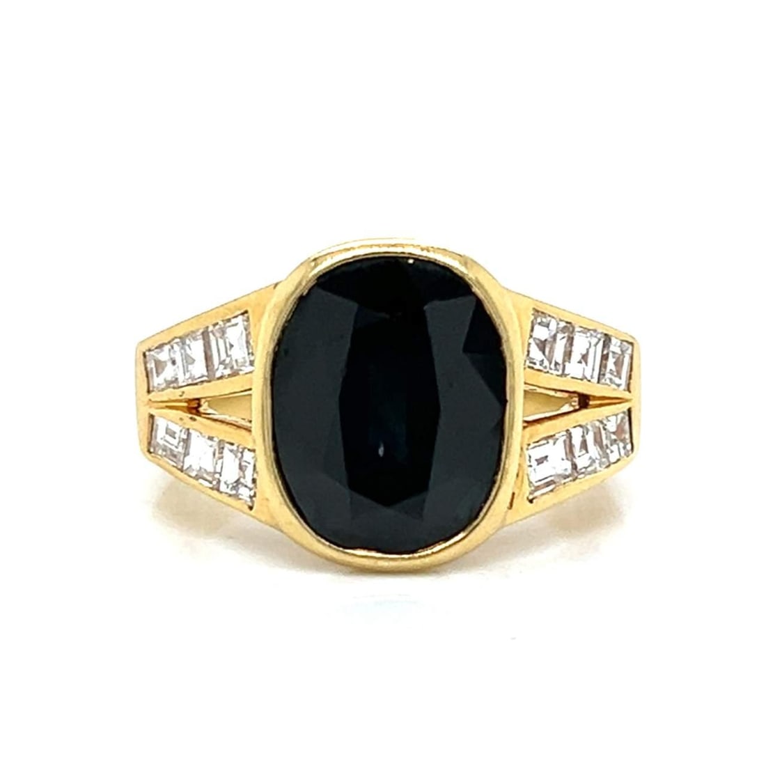 18K Yellow Gold 5.00 Ct Dark Sapphire and 12 Diamonds Ring: 18K Yellow Gold 5.00 Ct Dark Sapphire and 12 Diamonds Ring This exquisite ring features a stunning 5.00 Ct dark sapphire, beautifully complemented by 12 diamonds totaling approximately 1.20 Ct. The di
