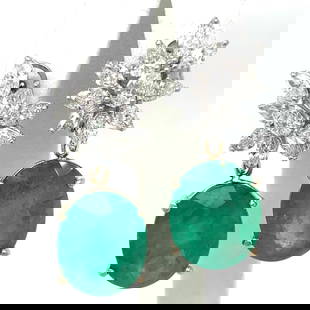 Stunning 18K White Gold Emerald Diamond Earrings 30.00 Ct: Stunning 18K White Gold Emerald Diamond Earrings 30.00 Ct Elevate your style with these stunning 18K White Gold Emerald & Diamond Earrings. Weighing 19.6 grams, each earring is adorned with two exquis