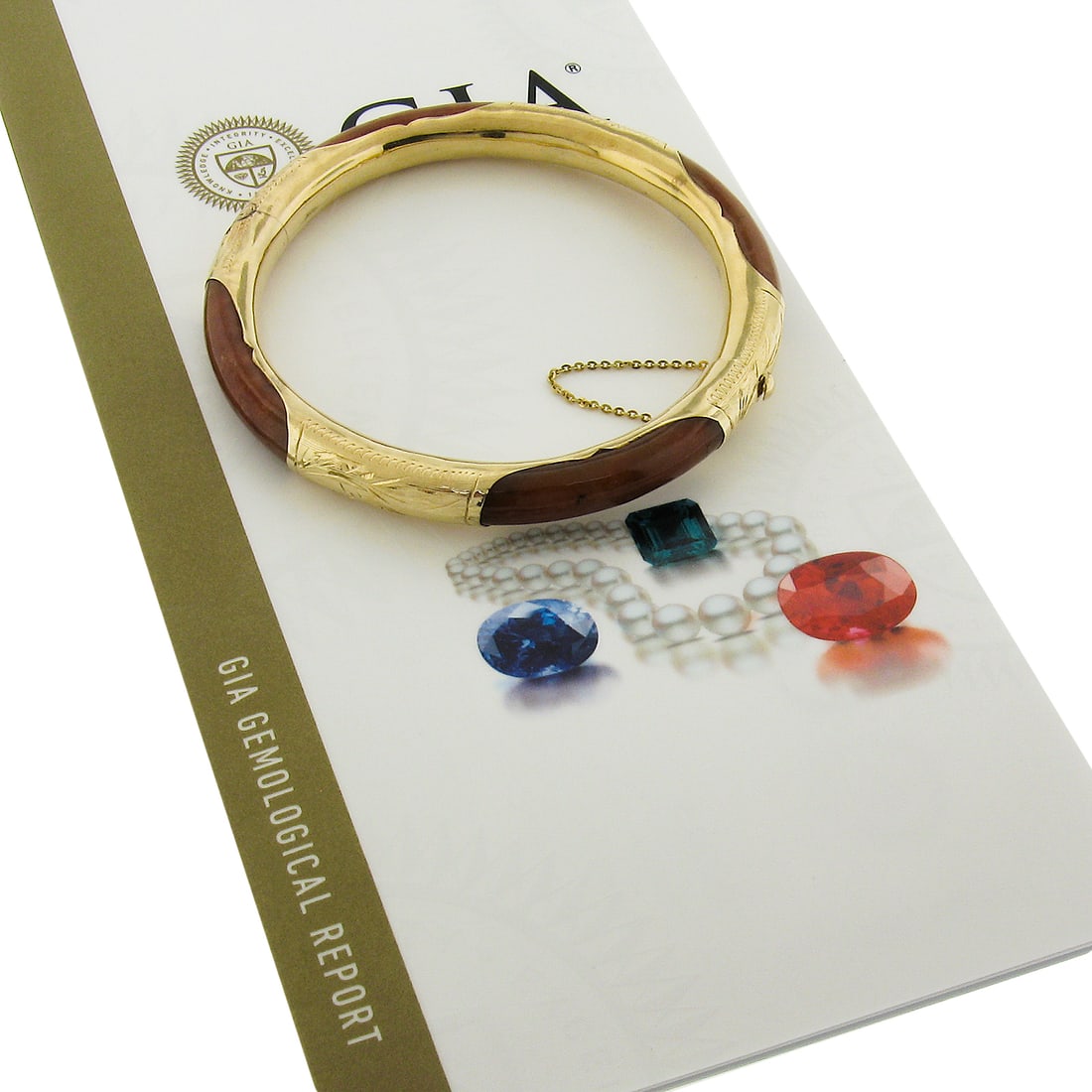 Vintage 14k Gold GIA Certified Arc Jade Bangle Bracelet with Floral Design: Vintage 14k Gold GIA Certified Arc Jade Bangle Bracelet with Floral Design Discover the elegance of this vintage 14k yellow gold bangle bracelet, featuring a stunning arc shape designed from natural o