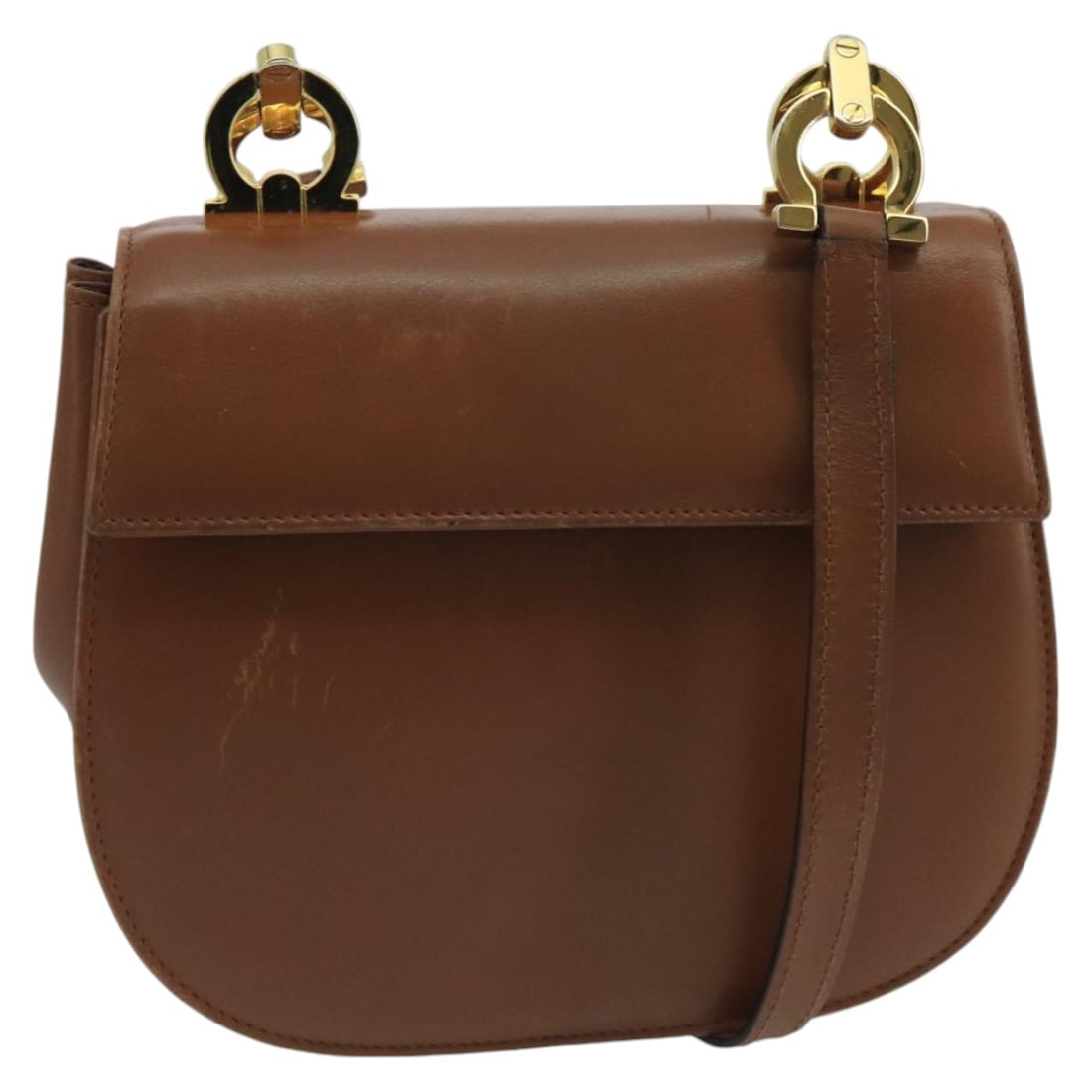 Salvatore Ferragamo Gold Brown Leather Shoulder Bag Auth Italy: Salvatore Ferragamo Gold Brown Leather Shoulder Bag Auth Italy This elegant Salvatore Ferragamo shoulder bag is crafted from high-quality leather, featuring a stunning gold and brown exterior. With a