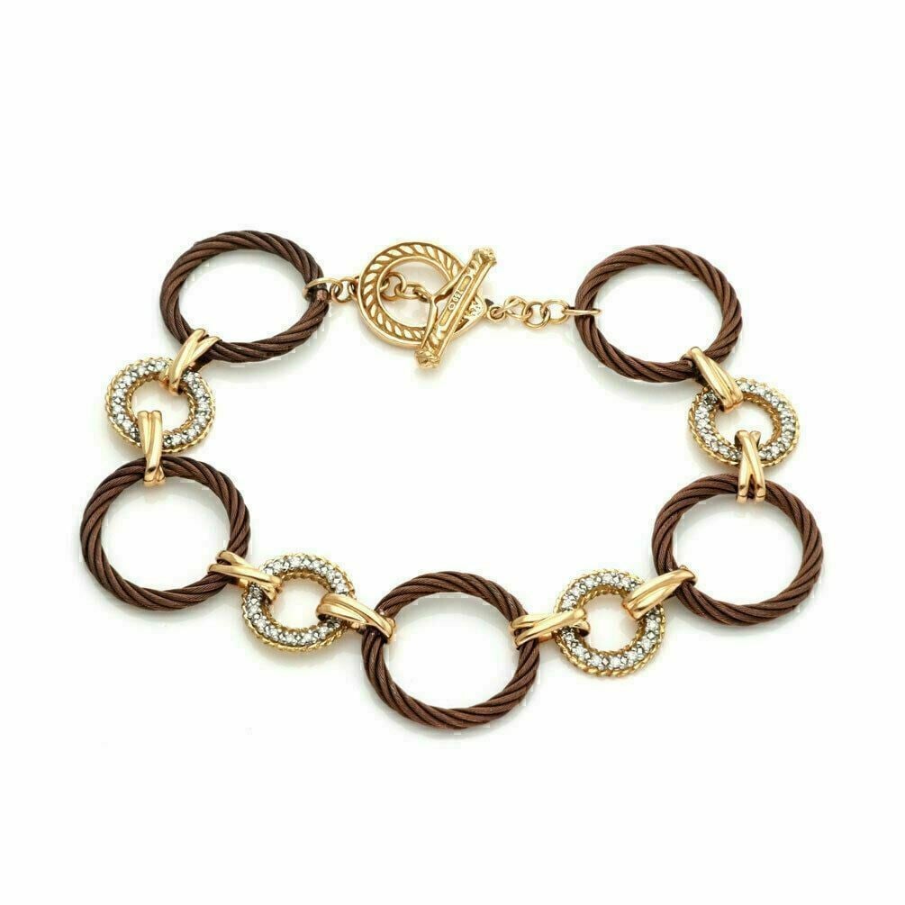 Charriol 18k Gold & Stainless Steel Diamond Link Bracelet: Charriol 18k Gold & Stainless Steel Diamond Link Bracelet The Charriol Diamond Stainless Steel & 18k Gold Circle Link Toggle Bracelet is a striking piece of fine jewelry, designed with a link style an