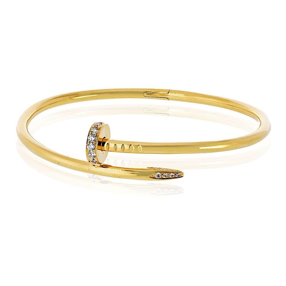 Cartier Juste Un Clou 18K Yellow Gold Bracelet Size 21: Cartier Juste Un Clou 18K Yellow Gold Bracelet Size 21 This exquisite pre-owned Cartier Juste Un Clou bracelet is a stunning piece crafted in 18K yellow gold. The classic size 21 model features a uniq
