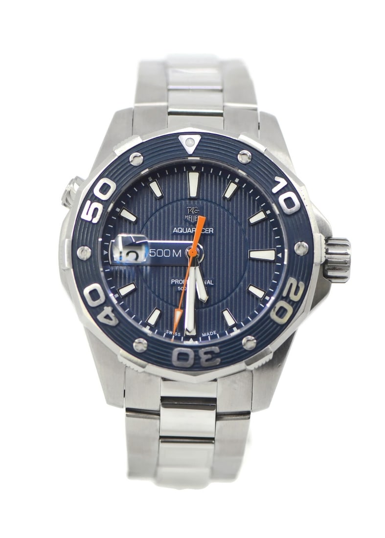 TAG Heuer Aquaracer WAJ1112 Stainless Steel Quartz Watch with Box and Papers: TAG Heuer Aquaracer WAJ1112 Stainless Steel Quartz Watch with Box and Papers This TAG Heuer Aquaracer wristwatch combines elegance and functionality, featuring a striking blue dial and a robust stainl