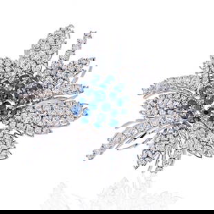Stunning 18K White Gold Diamond Sapphire Floral Brooch 13 Carats: Stunning 18K White Gold Diamond Sapphire Floral Brooch 13 Carats This exquisite 18K White Gold Diamond and Sapphire Cluster Brooch features a stunning floral design, adorned with a total of 150 brilli