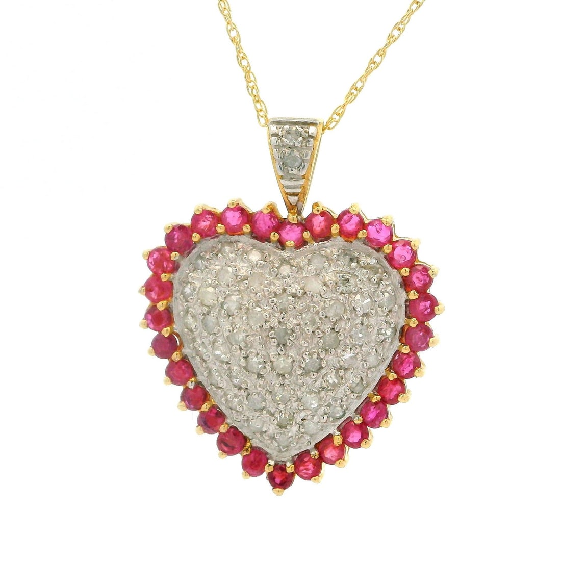 10k Gold Heart Pendant Necklace with Diamond Cluster and Ruby Frame: 10k Gold Heart Pendant Necklace with Diamond Cluster and Ruby Frame This exquisite heart pendant necklace showcases a stunning diamond cluster framed by vibrant rubies. Crafted from 10k yellow and whi
